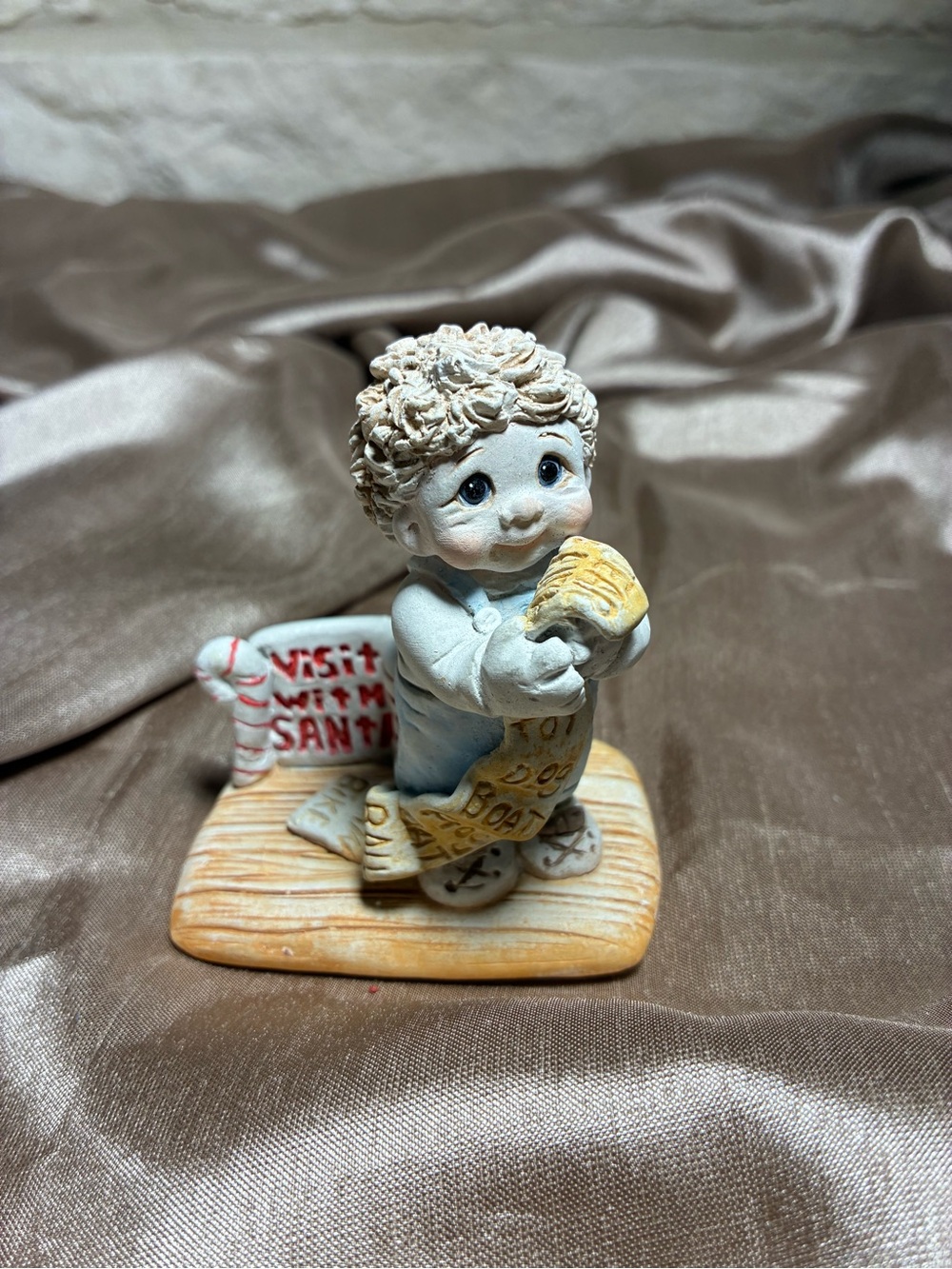 Dreamcycles Hand-Painted Cream and Blue Holiday Figurine - Child with Toy
